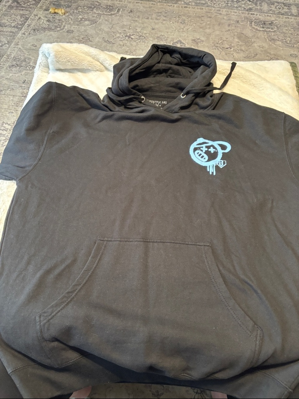 Men's Black Pullover Hoodie with light blue Chest Graphic
